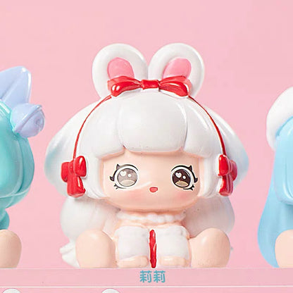 Cute girl sitting in a row toy mini bean